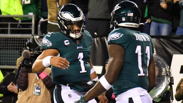 Jan 21, 2023; Philadelphia, Pennsylvania, USA; Philadelphia Eagles quarterback Jalen Hurts (1) celebrates his touchdown with wide receiver A.J. Brown (11) during the second quarter against the New York Giants during an NFC divisional round game at Lincoln Financial Field.